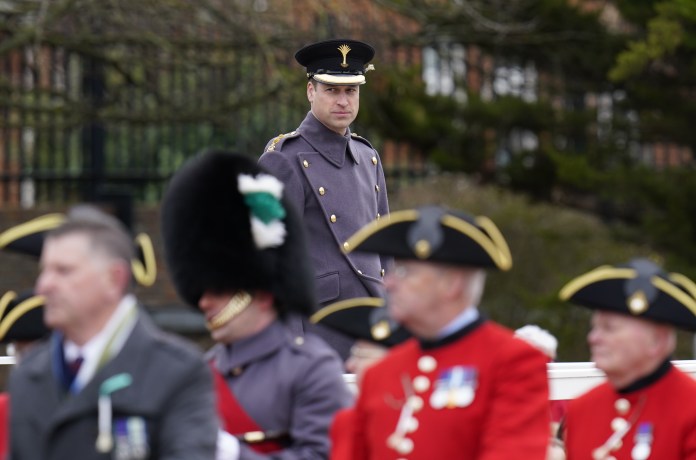 William watches a march past during the St David’s Day visit