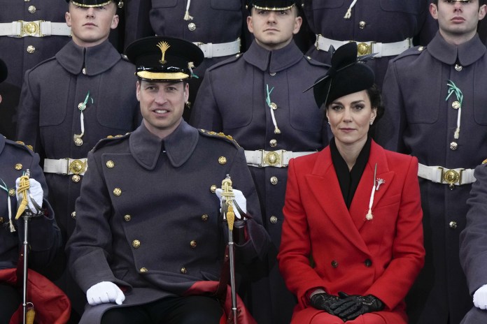 The Prince of Wales, Colonel of the Welsh Guards, and the Princess of Wales, pose for an official photo with the Prince of Wales’ company during a visit to the 1st Battalion Welsh Guards in Windsor